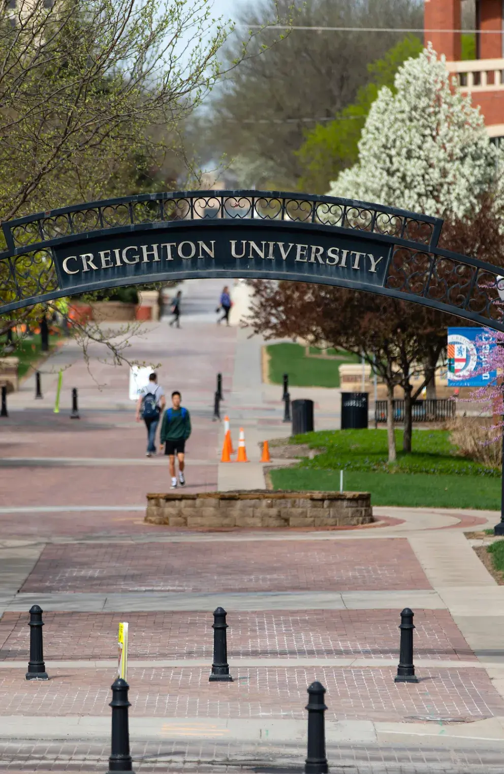 Creighton Arch with people walking