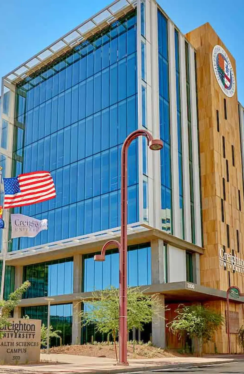 Creighton Phoenix Campus facility on sunny day.