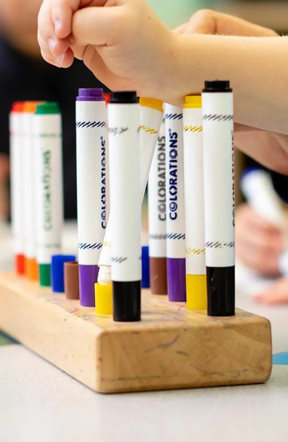 Children using markers.