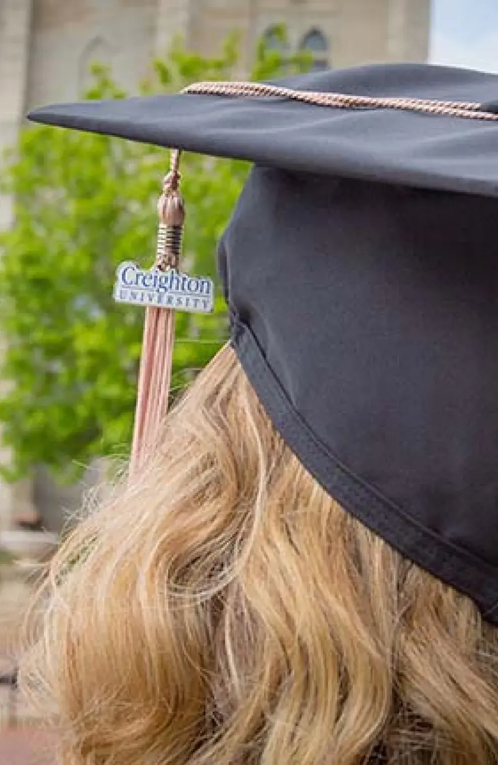 creighton grad with cap
