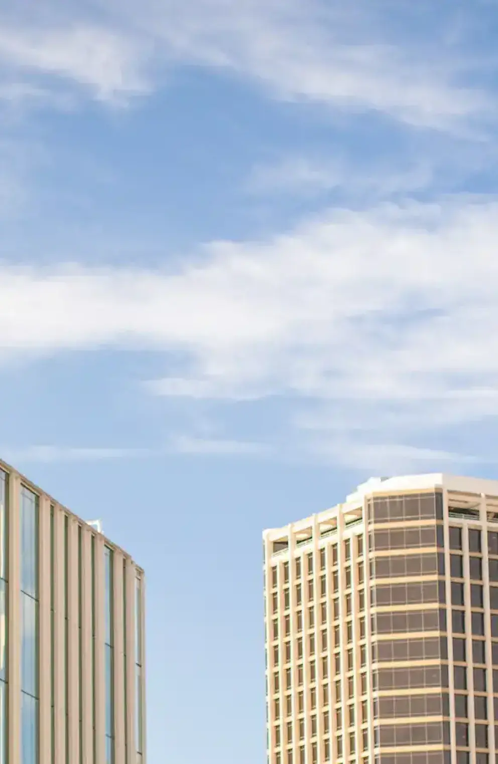 Phoenix campus exterior with palm trees.