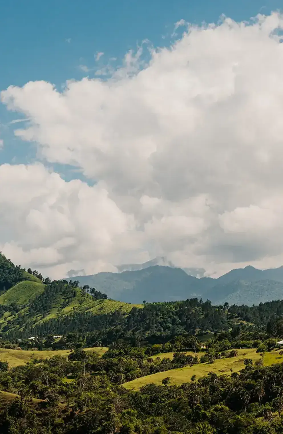 Mountain side view with white clouds