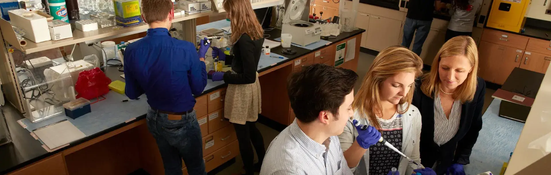 Dr. Julie Soukup in lab with students