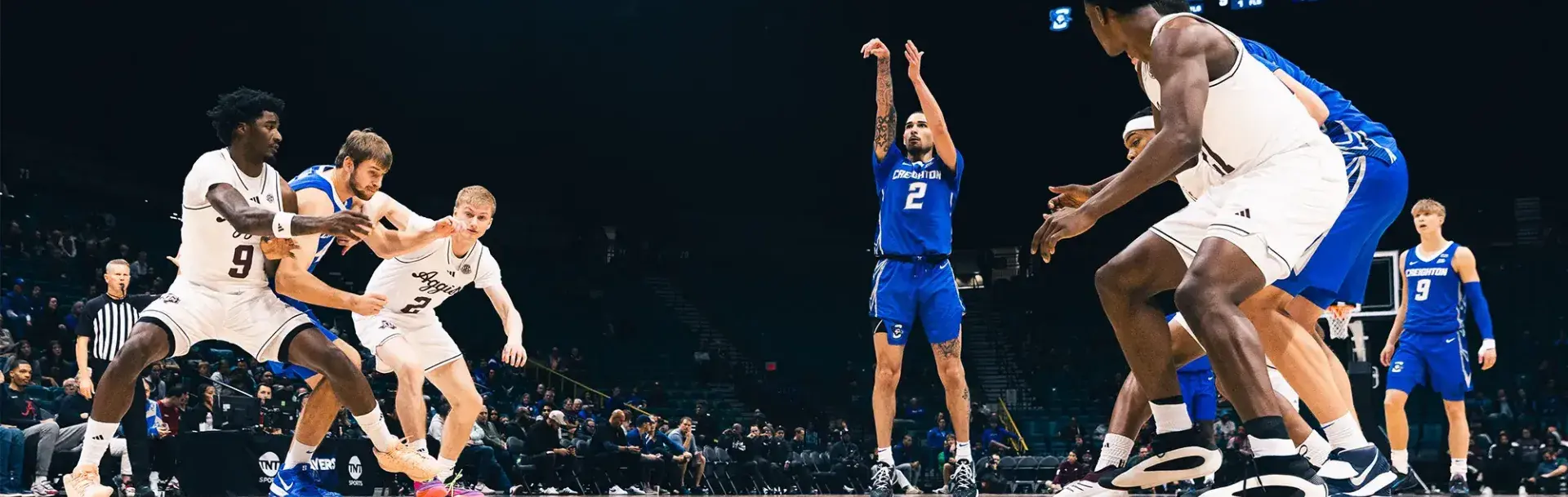 Creighton men's basketball team on the court.