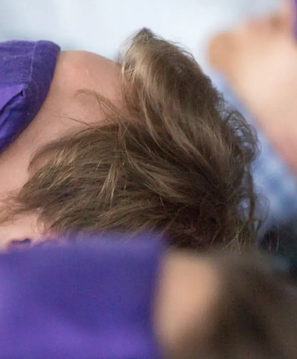 Yoga students wearing eye masks