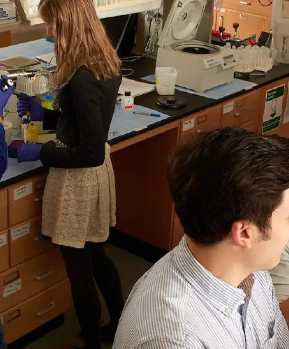 Dr. Julie Soukup in lab with students
