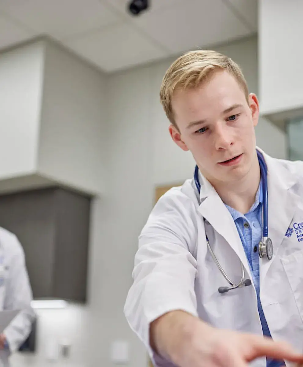 Practicing examination techniques in simulation lab.