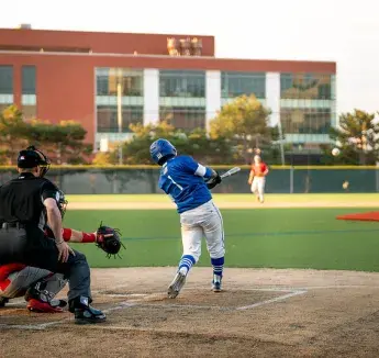 Students playing baseball