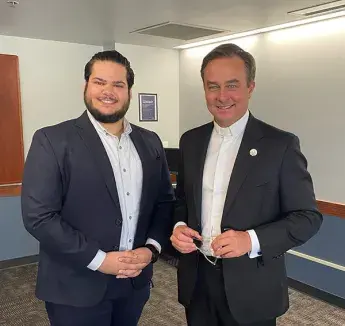 Nick Variava with Father Hendrickson