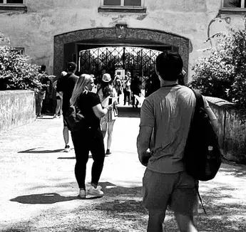 group visiting nuremberg camp setting.