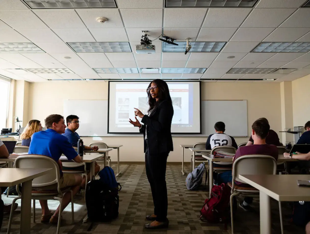 Professor lecturing in small classroom