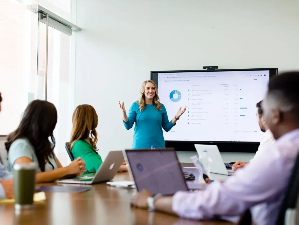 Student presenting work in conference room