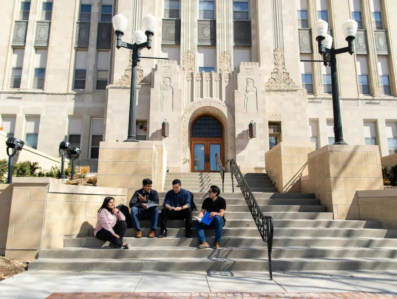 Students sitting on staircase