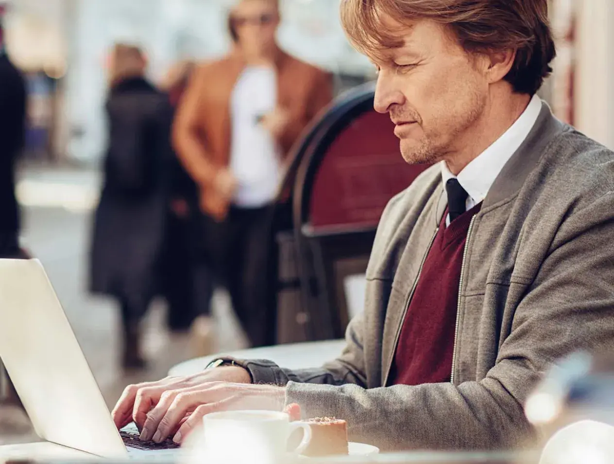 Adult student working at laptop