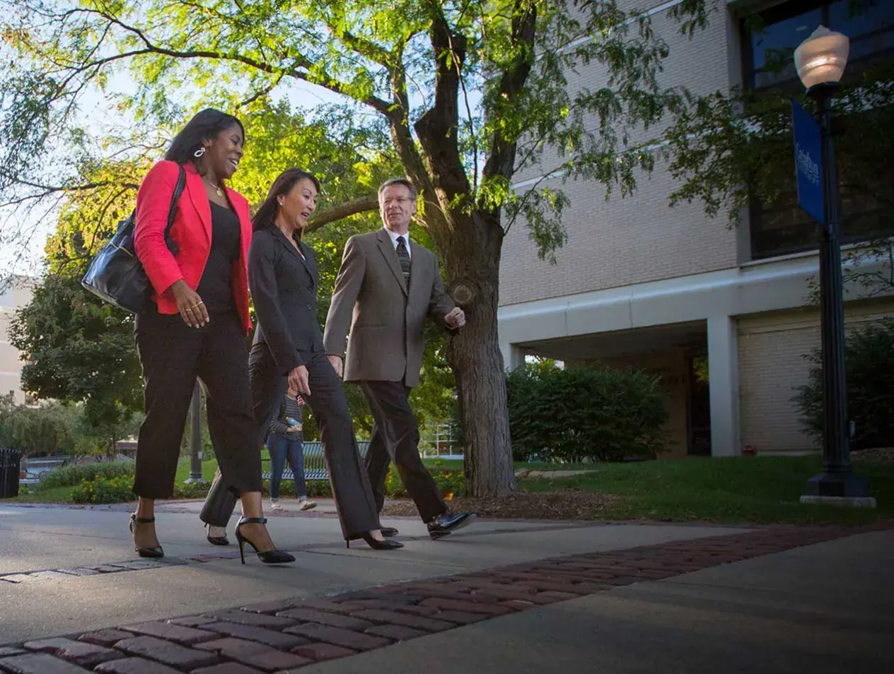 Creighton staff walking on campus