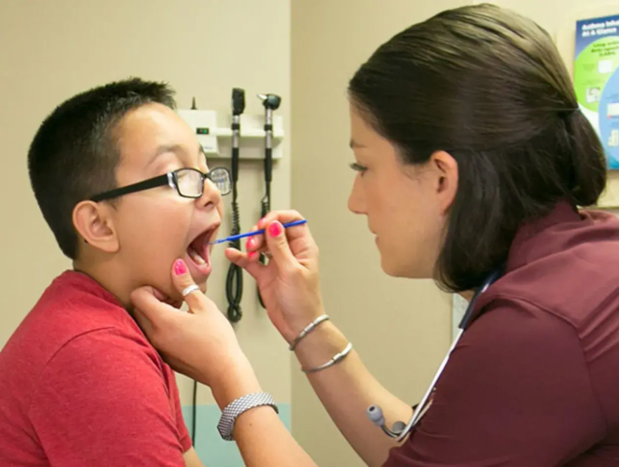 med student with pediatric patient
