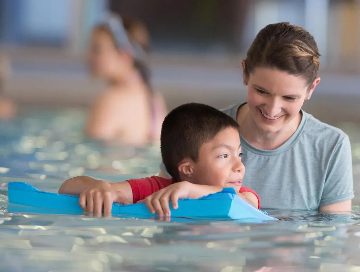 Pediatric patient in Aquatic Therapy with Resident