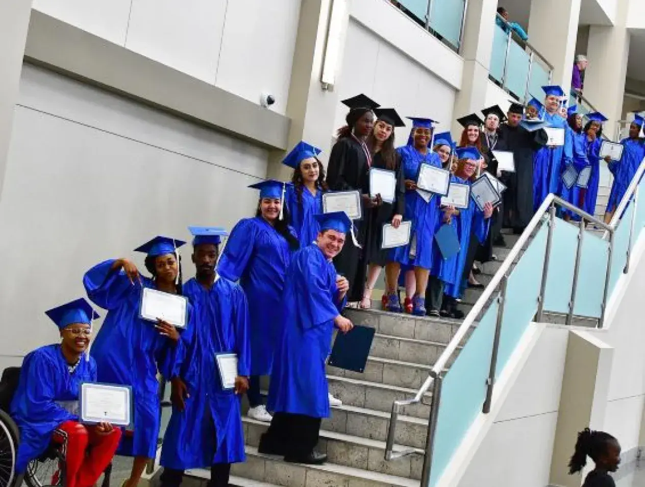 GED grads on stairwell