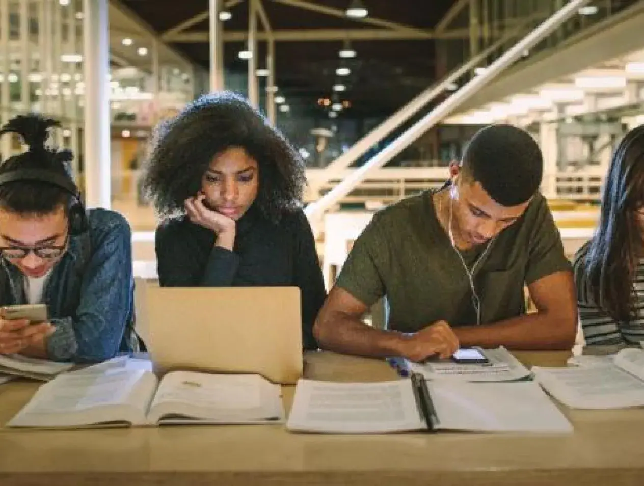 TRiO students studying at table