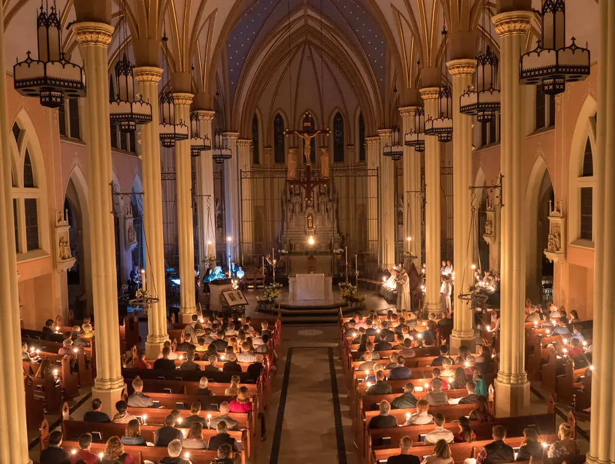 Parishioners during a candlelight Mass