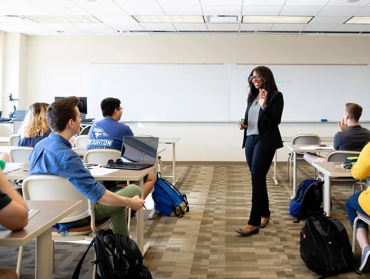 A professor teaching a class of students