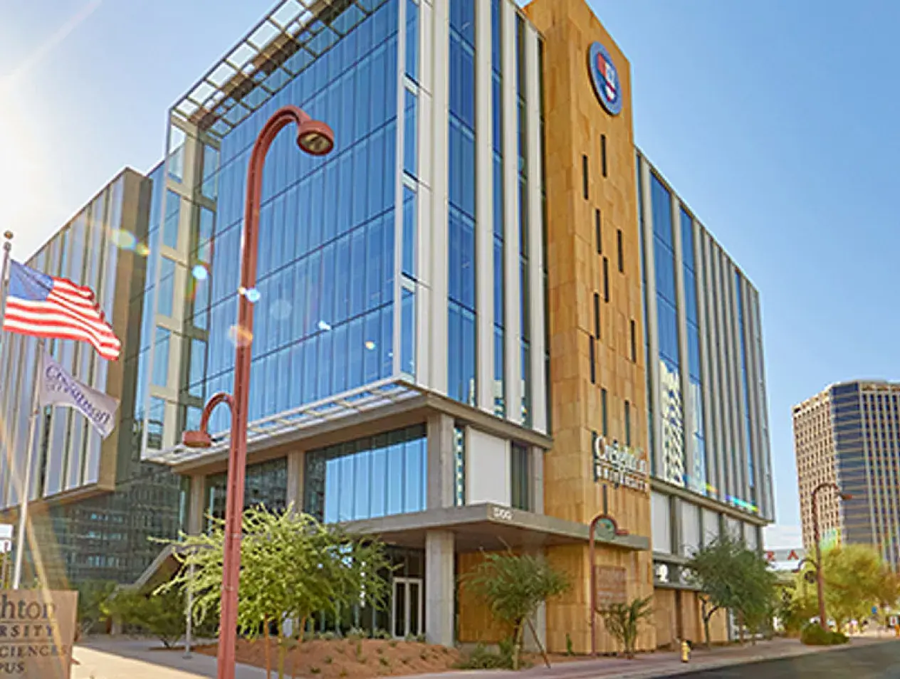 Phoenix Campus with sun burst over building