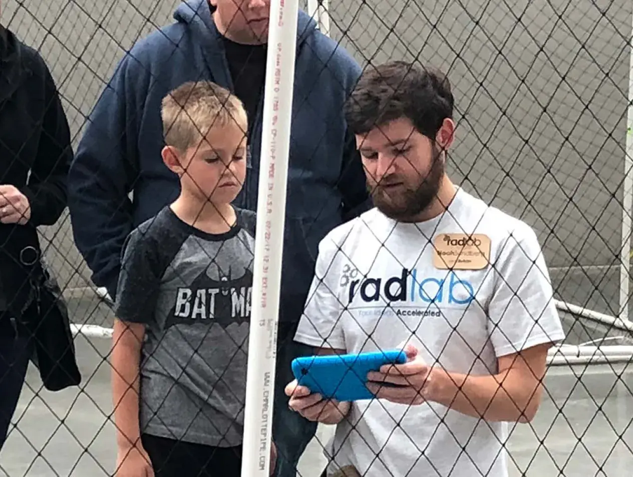 Radlab intern demonstrating how to control a mini drone