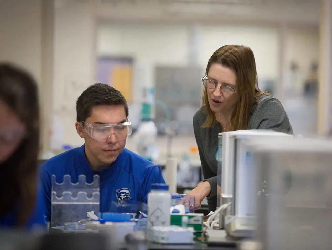 Dr. Erin Gross with student in lab