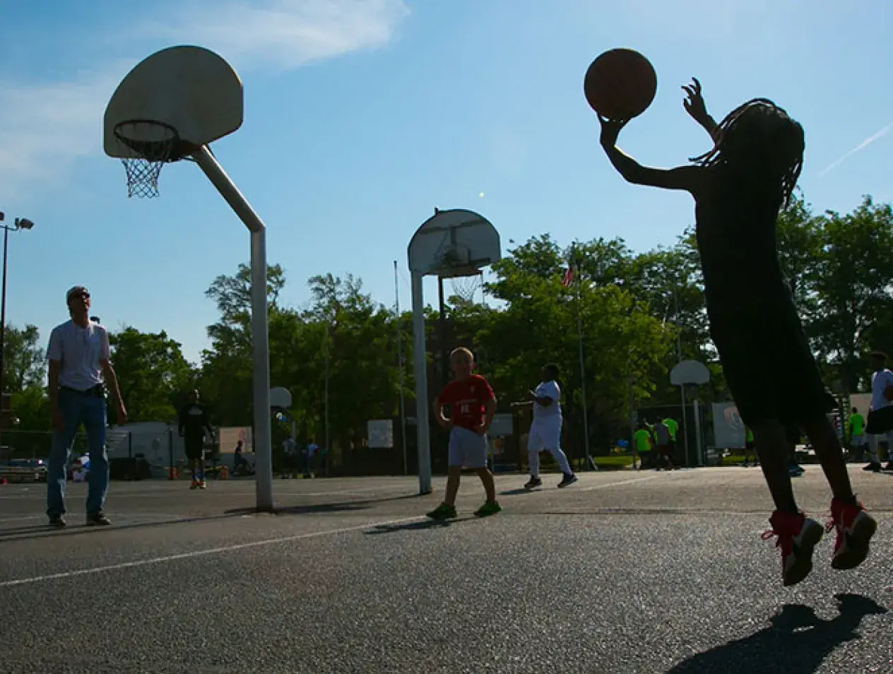HS-MACA community outreach, playing basketball