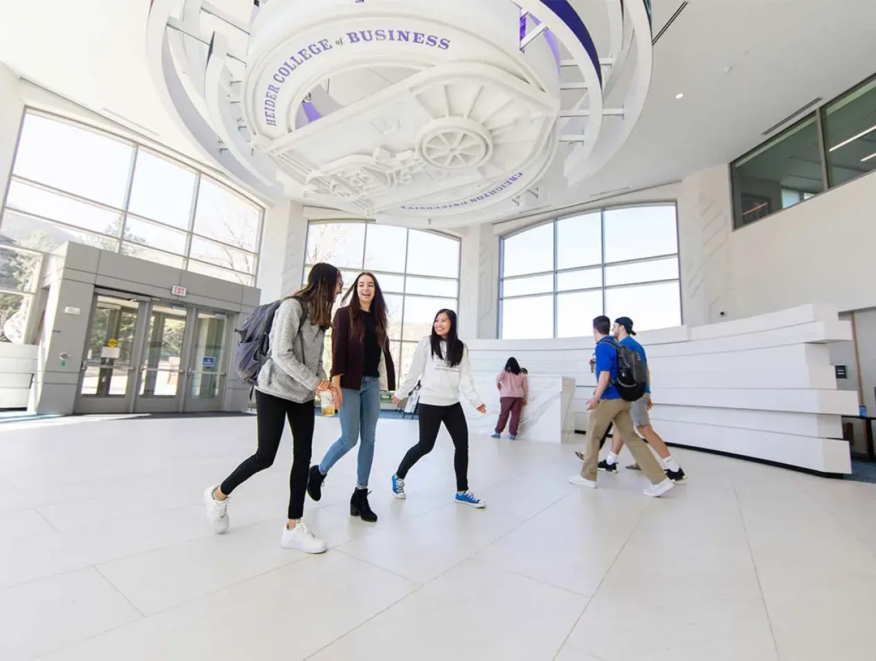 Students walking through Heider College of Business