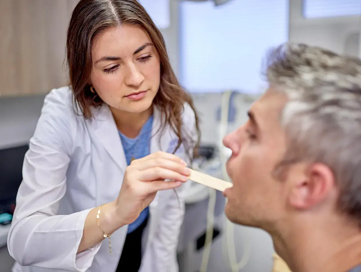 Doctor examining patient