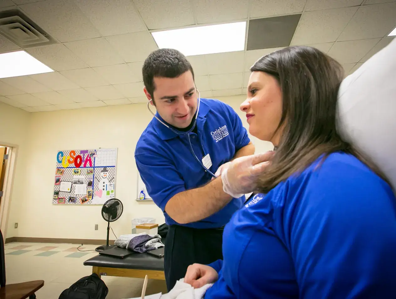 OT student using stethoscope