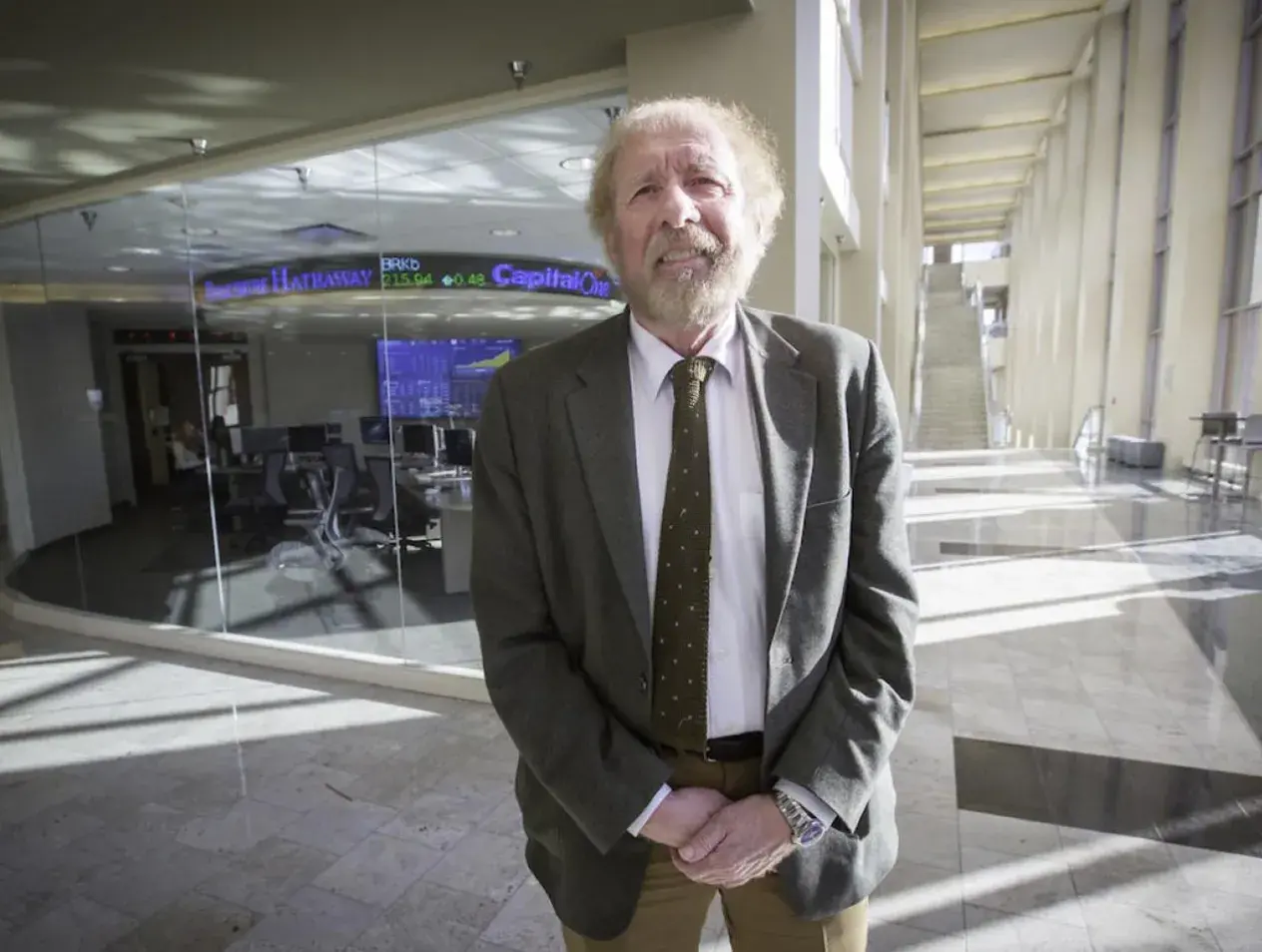 Ernie Goss standing in Heider Business College