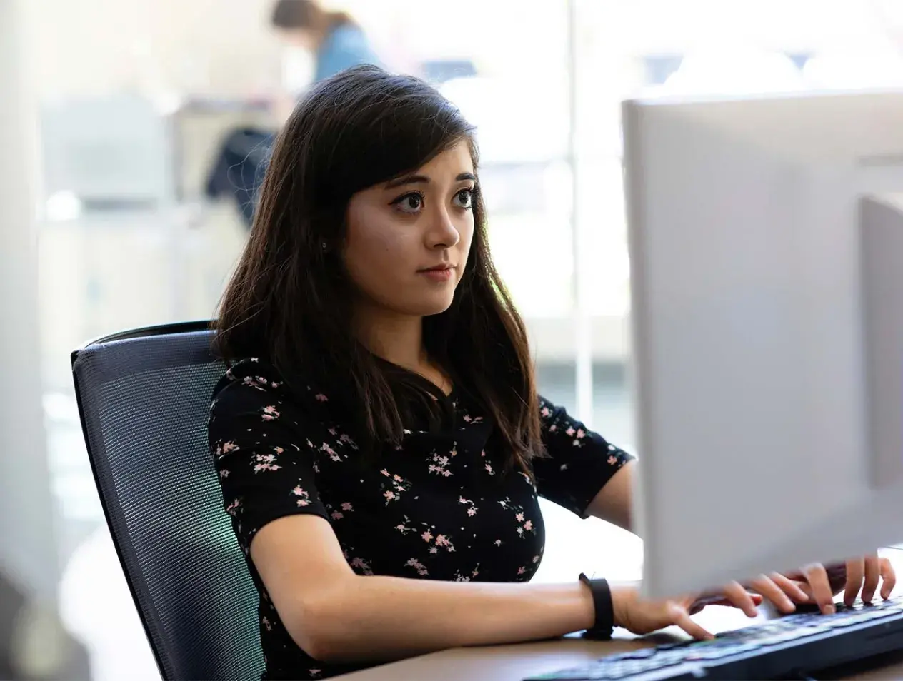 Finance student at computer