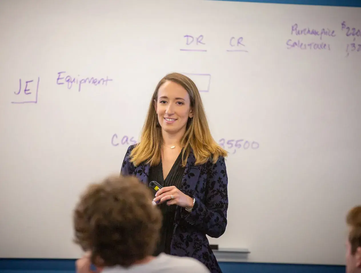 Janessa Stormberg teaching accounting class.