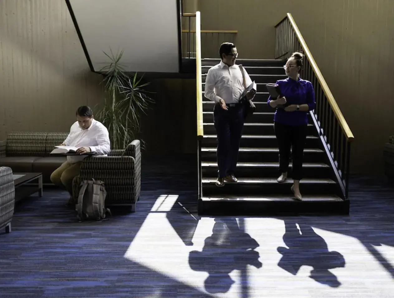 Law students walking down staircase