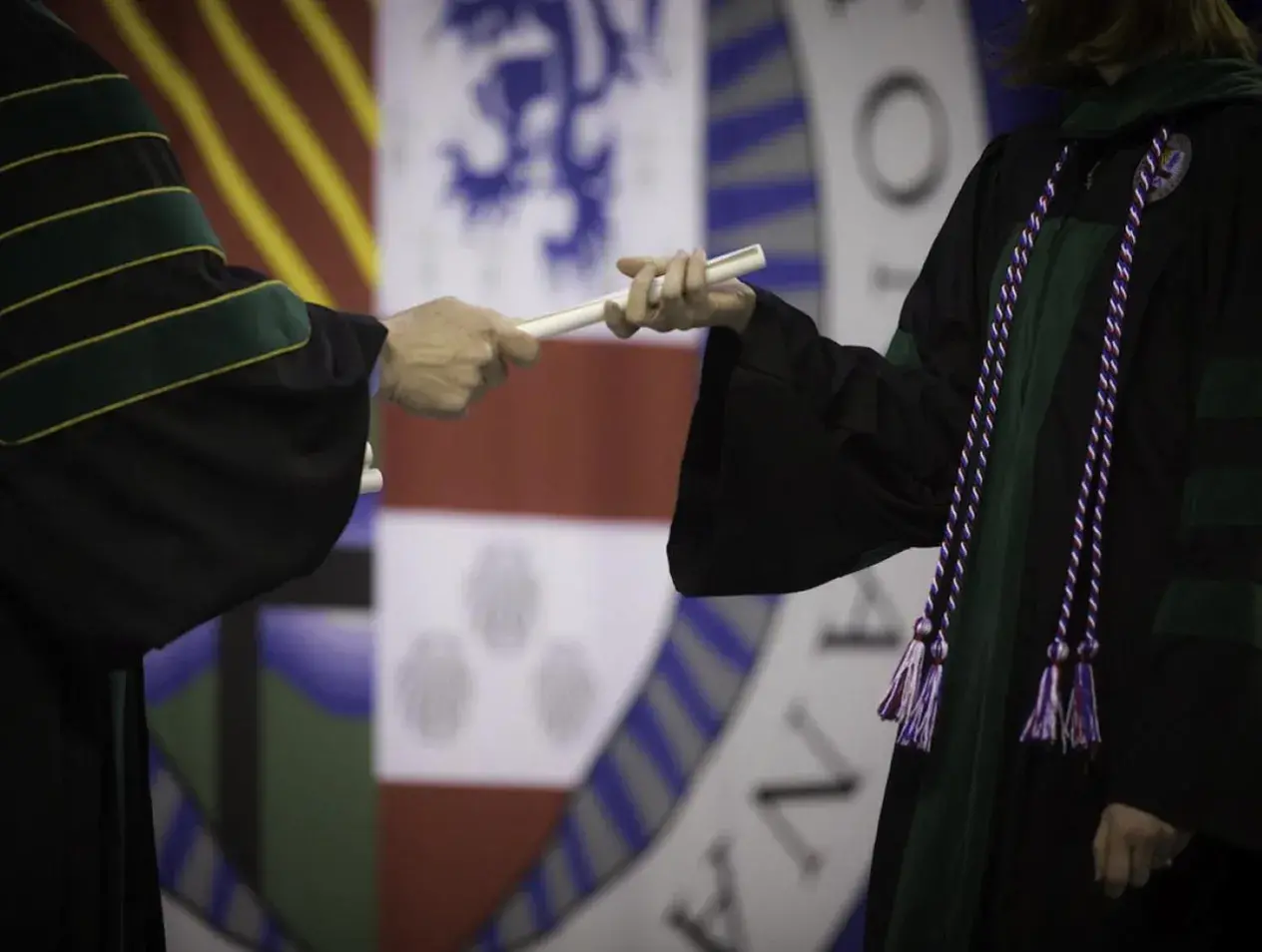 Student receiving diploma 