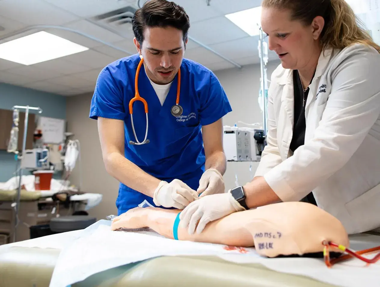 Nursing student practicing their skills.