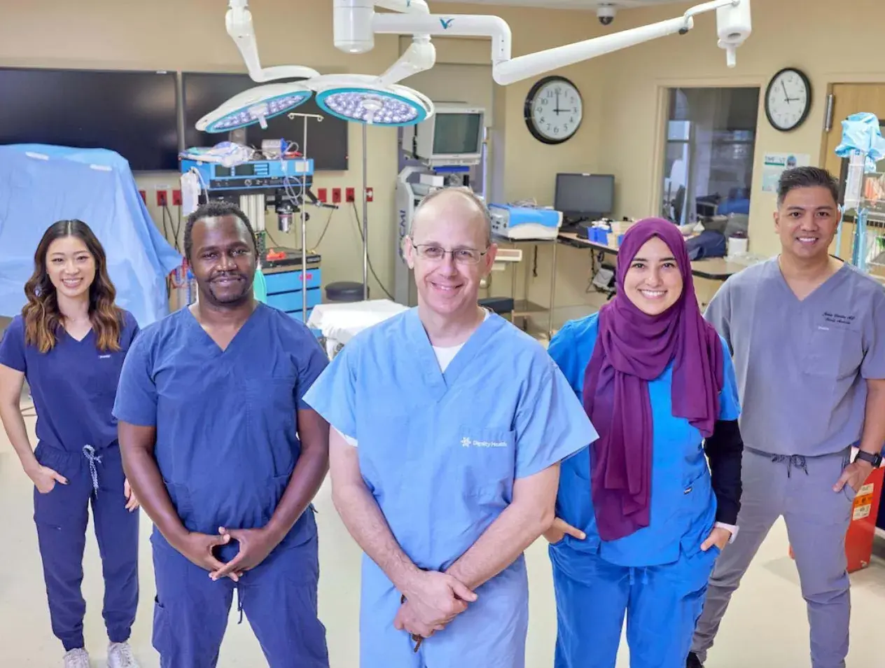 Alliance workers posing in hospital setting