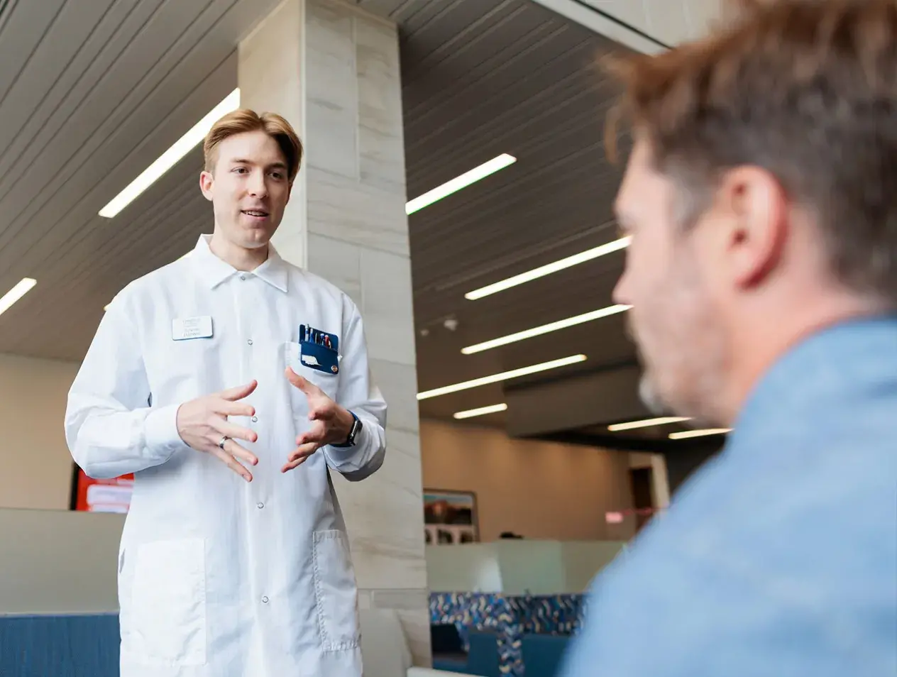 Dental student explaining to patient