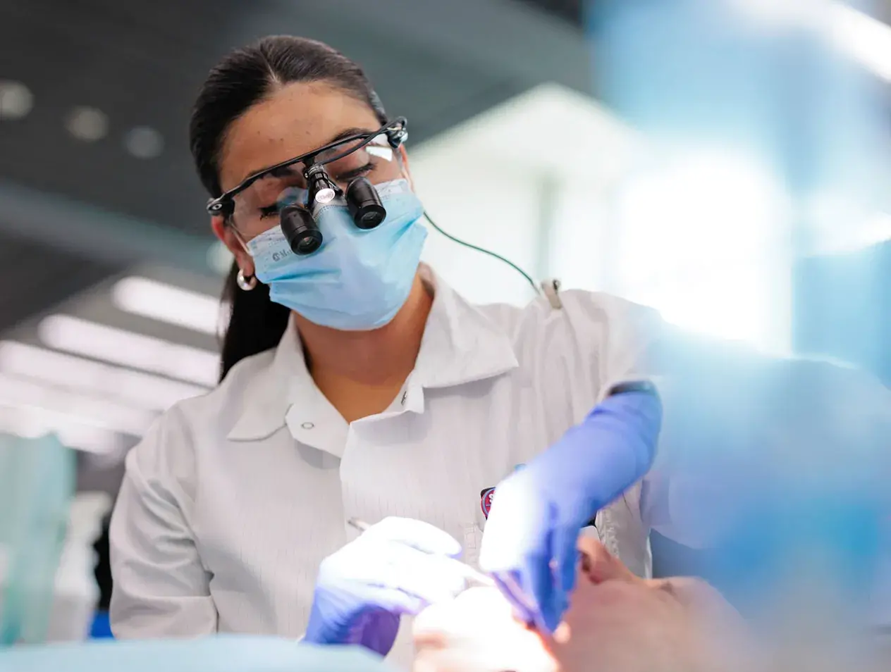 Dentist examining teeth