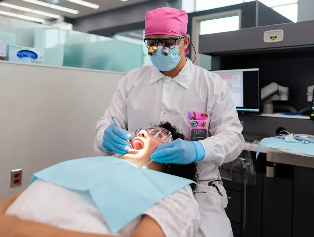 Dentist working on patient's teeth
