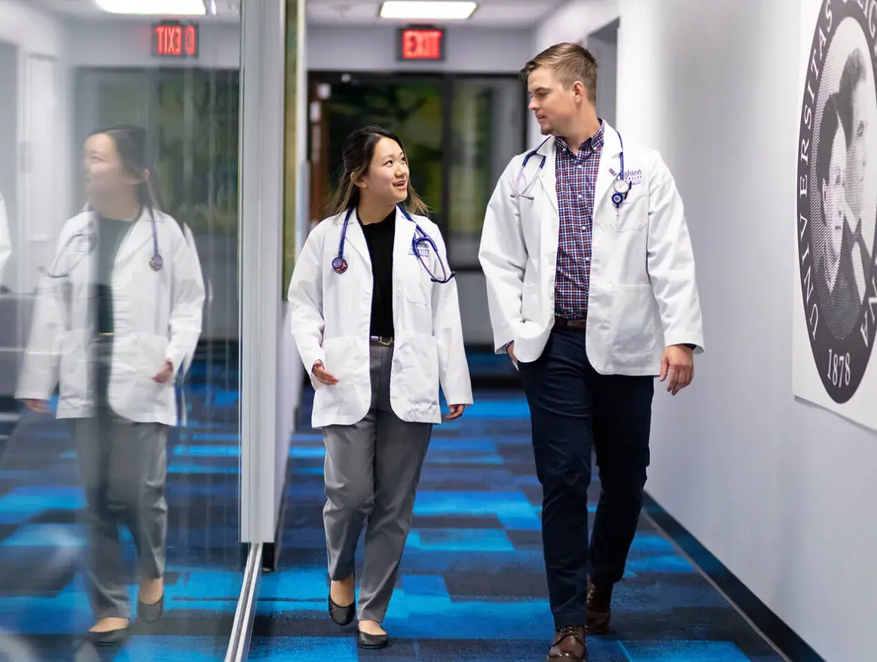 IM residents walking in hallway