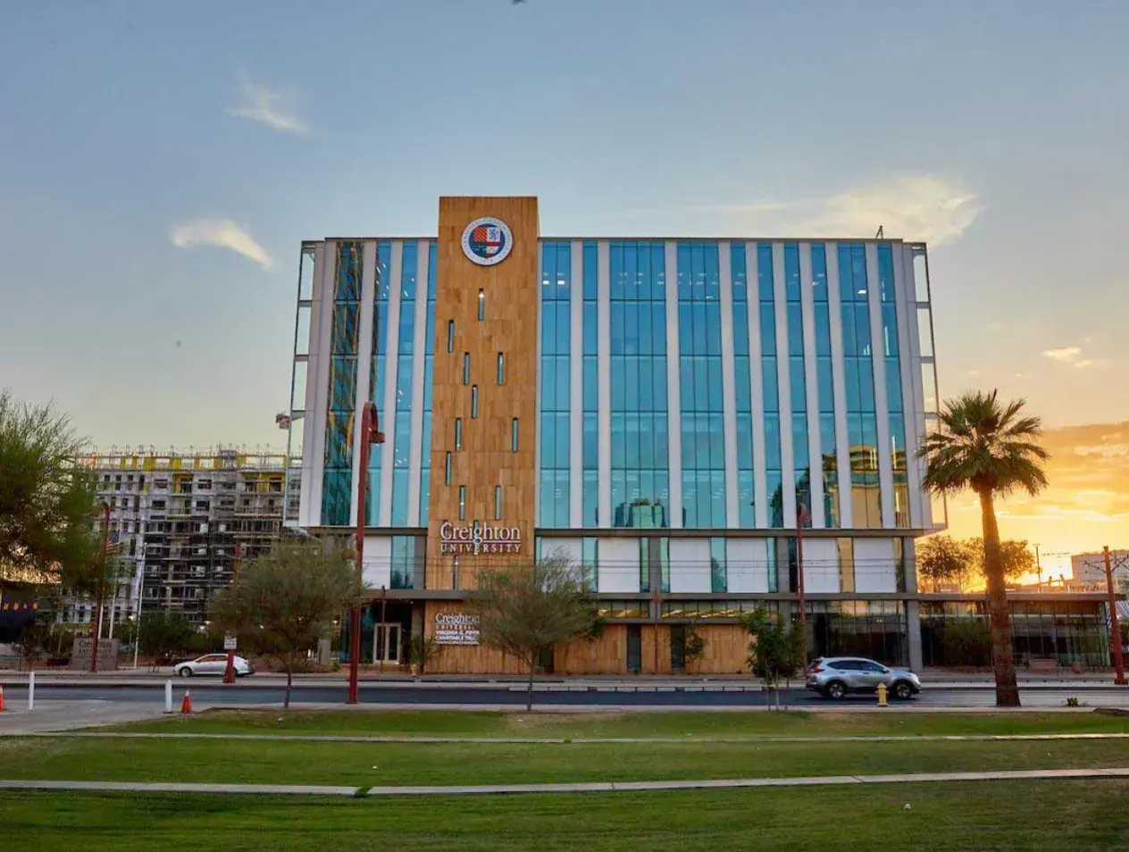 Creighton Arizona Health Alliance facility with sunrise behind.