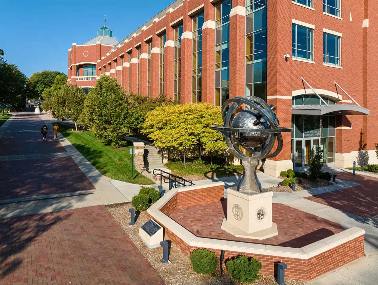 Globe statue in front of Harper Center