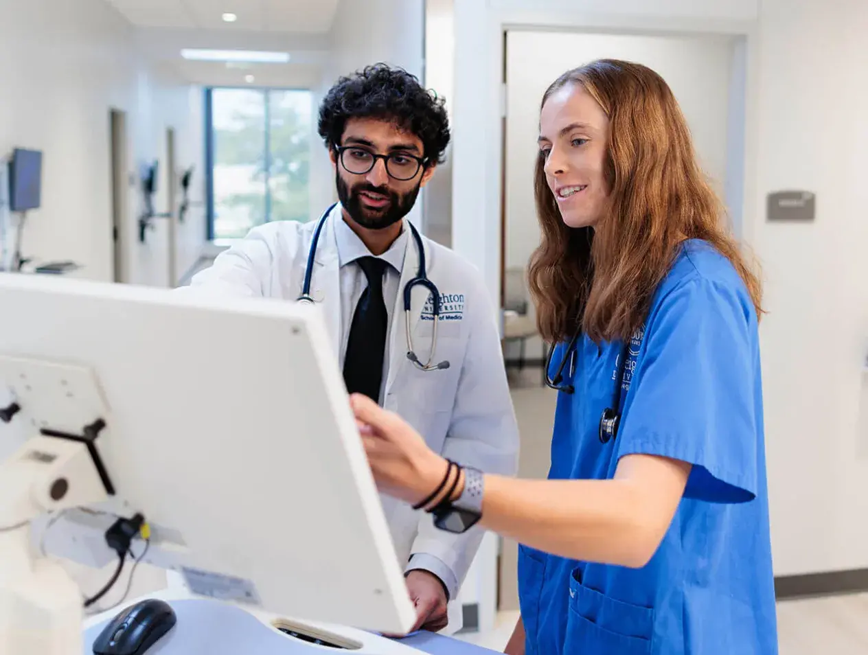 Medicine faculty and student