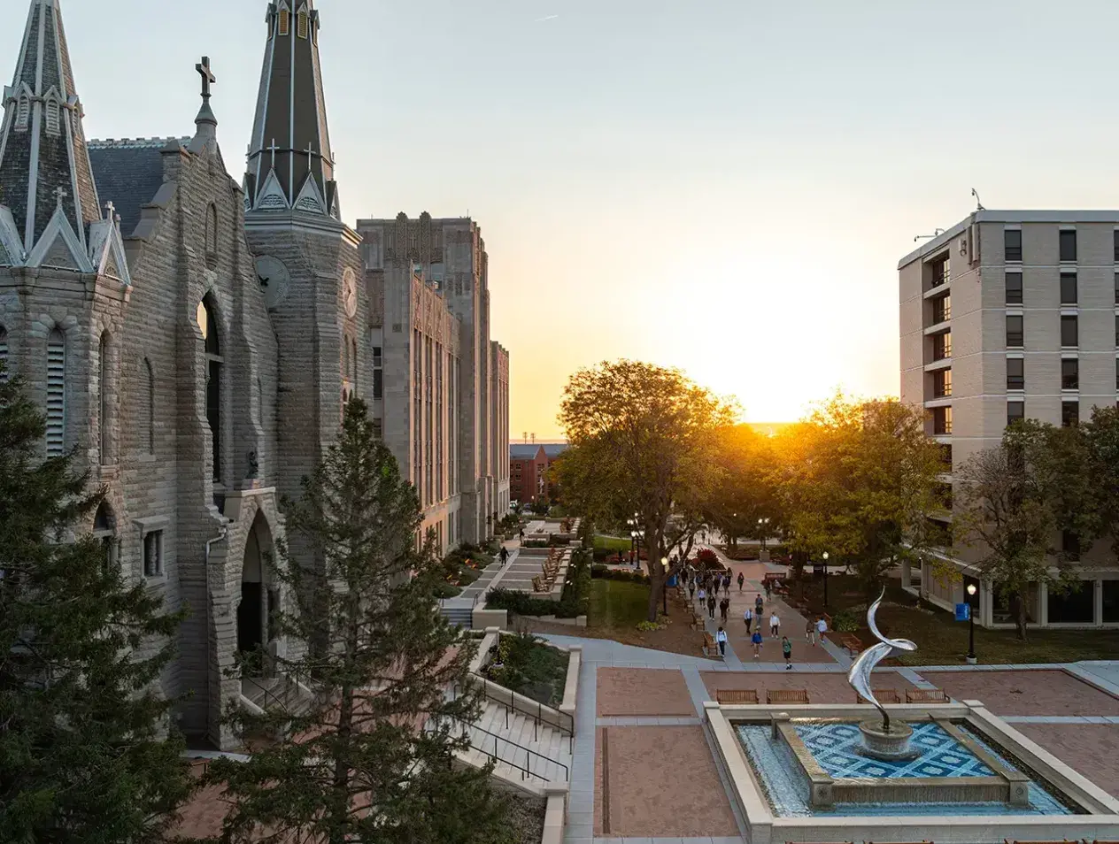 Campus mall drone view at sunrise.