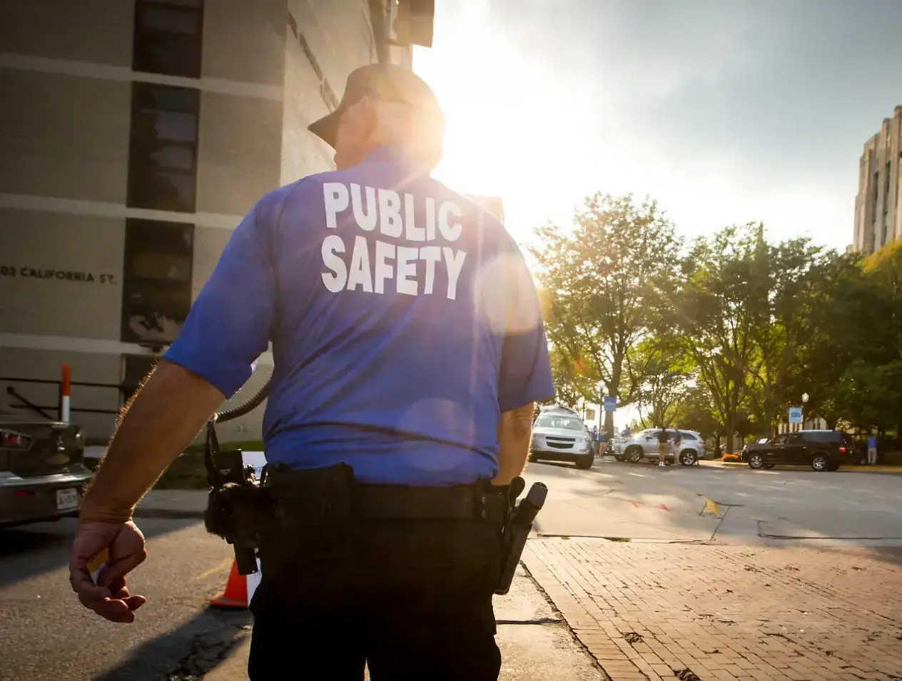 Safety officer walking on campus.