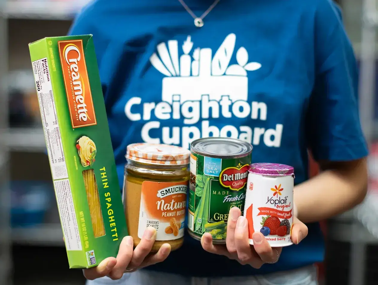 Creighton Cupboard t-shirt with food items