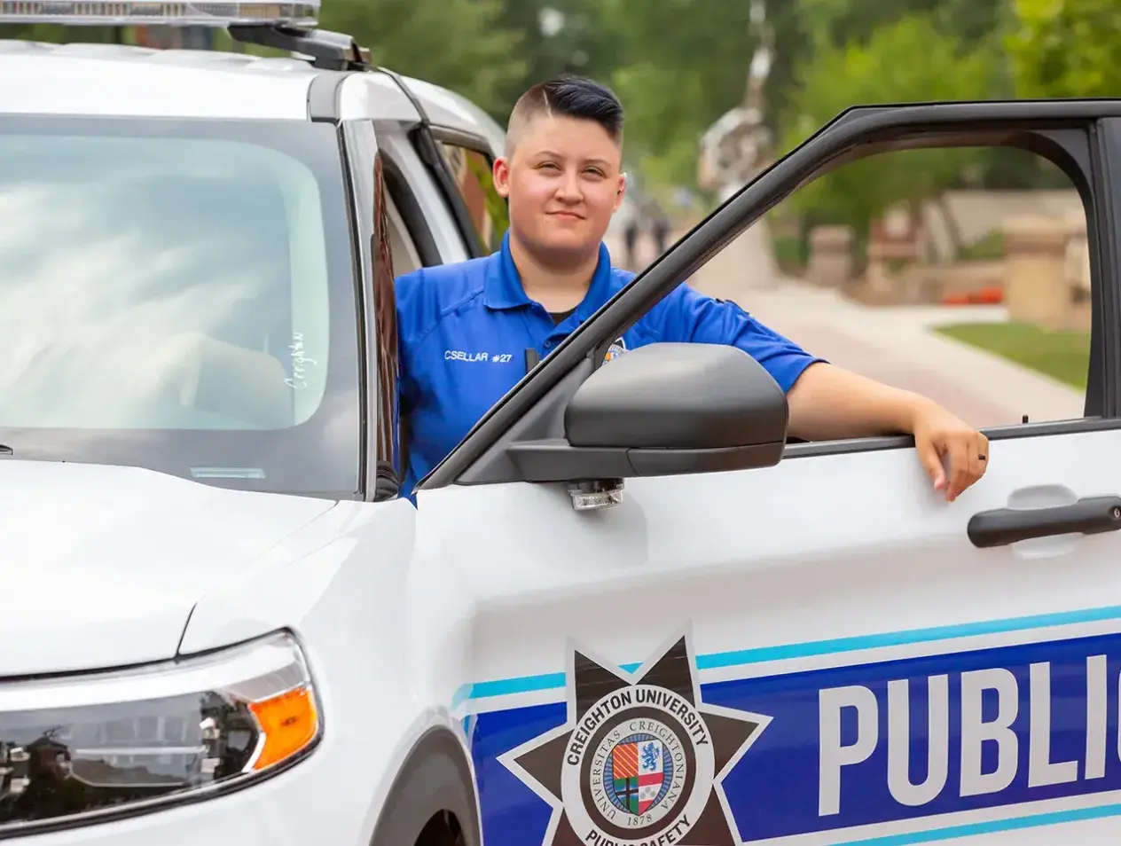 Safety officer in security vehicle.